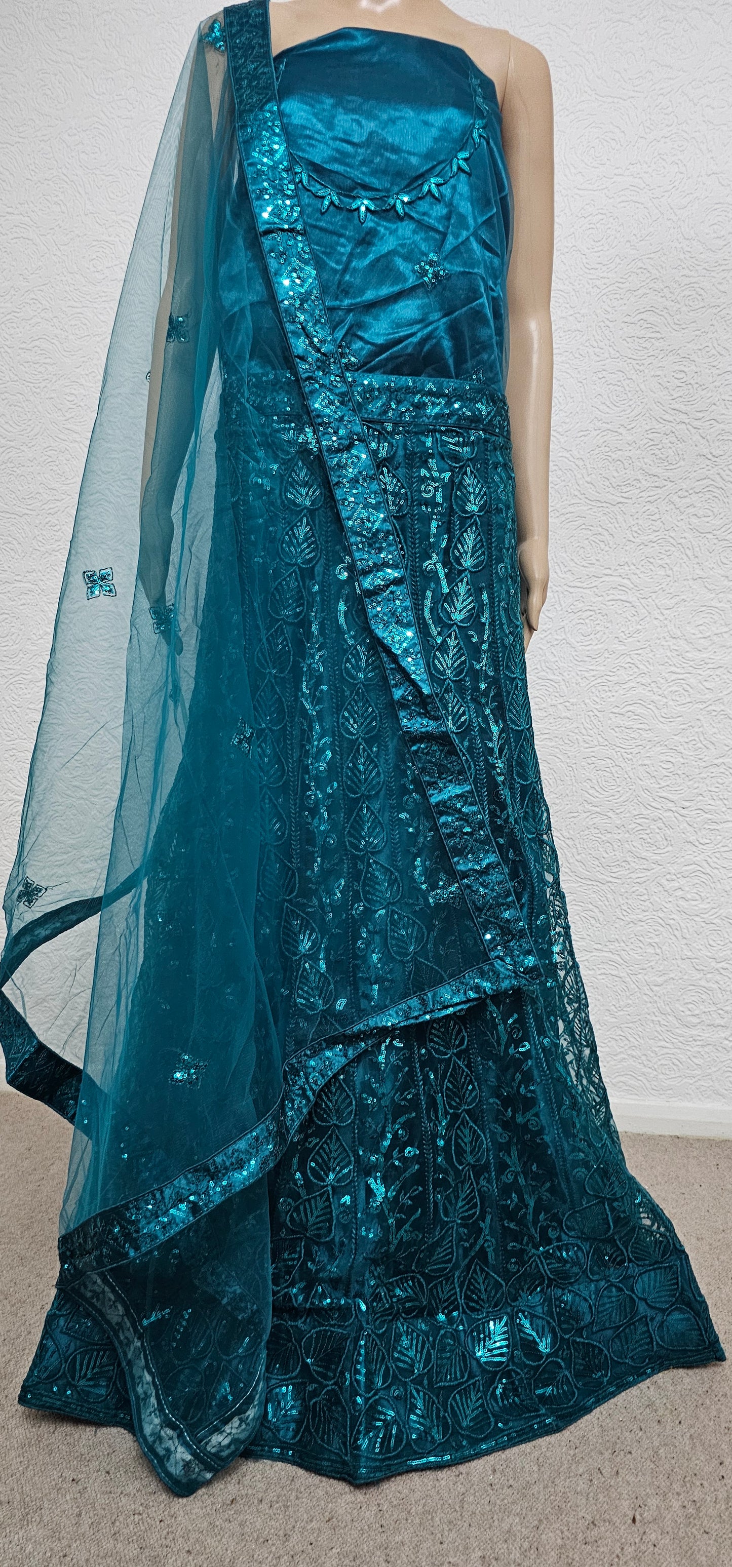 Teal Shourya Net Semi Stitched Lehenga Choli With Dupatta
