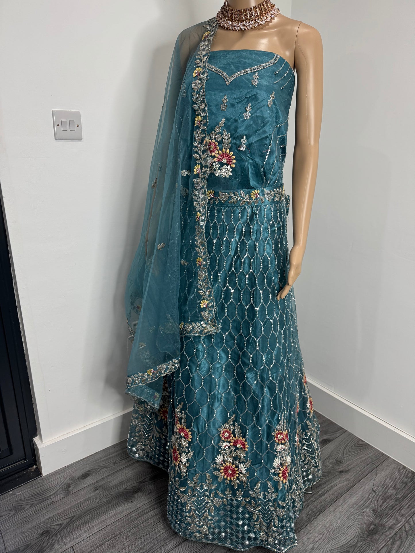 Teal Sharmili Net Semi Stitched Lehenga Choli With Dupatta