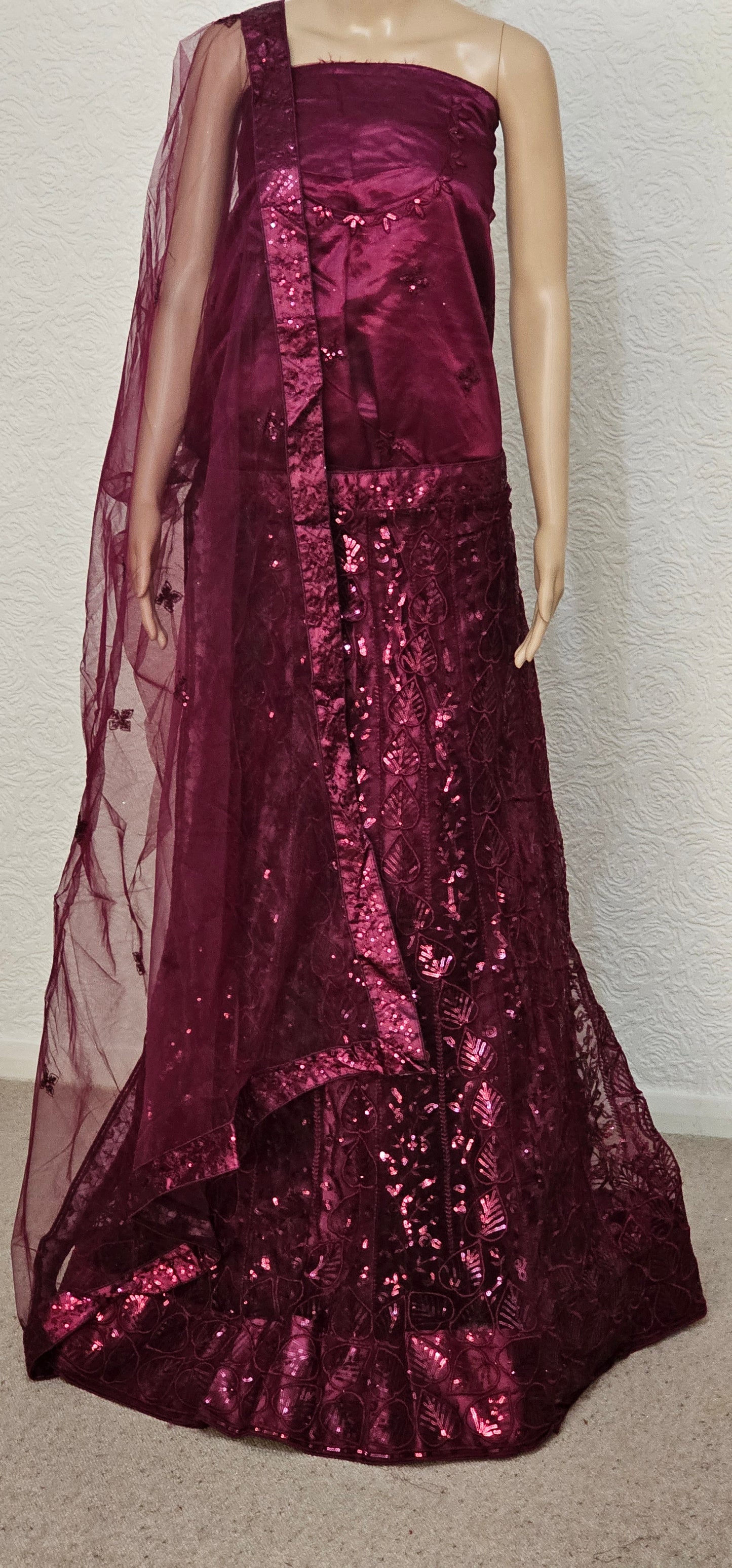 Wine Shourya Net Semi Stitched Lehenga Choli With Dupatta
