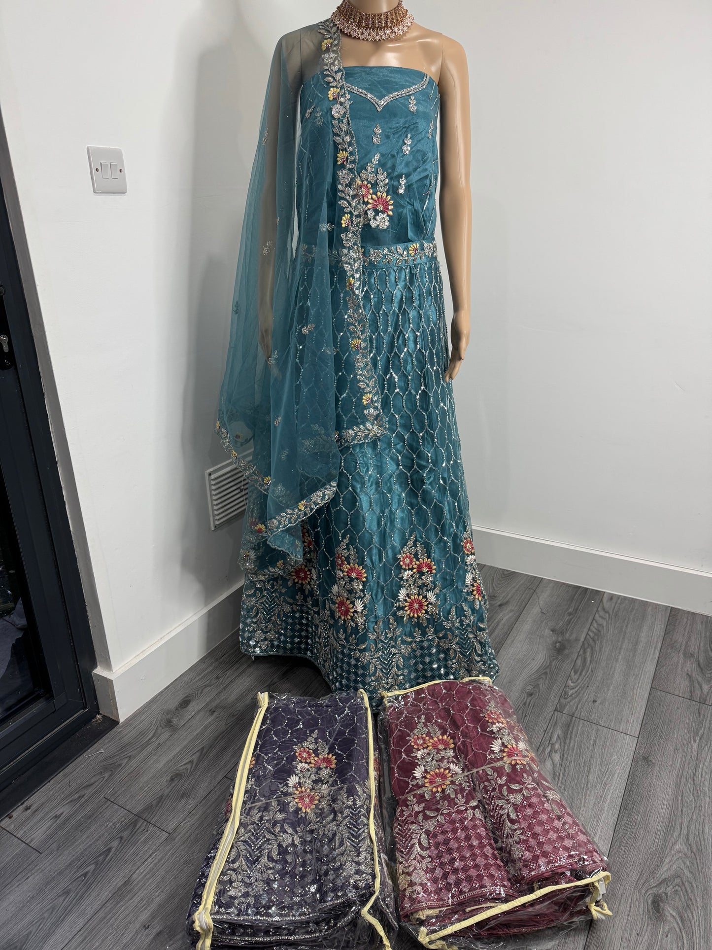 Teal Sharmili Net Semi Stitched Lehenga Choli With Dupatta
