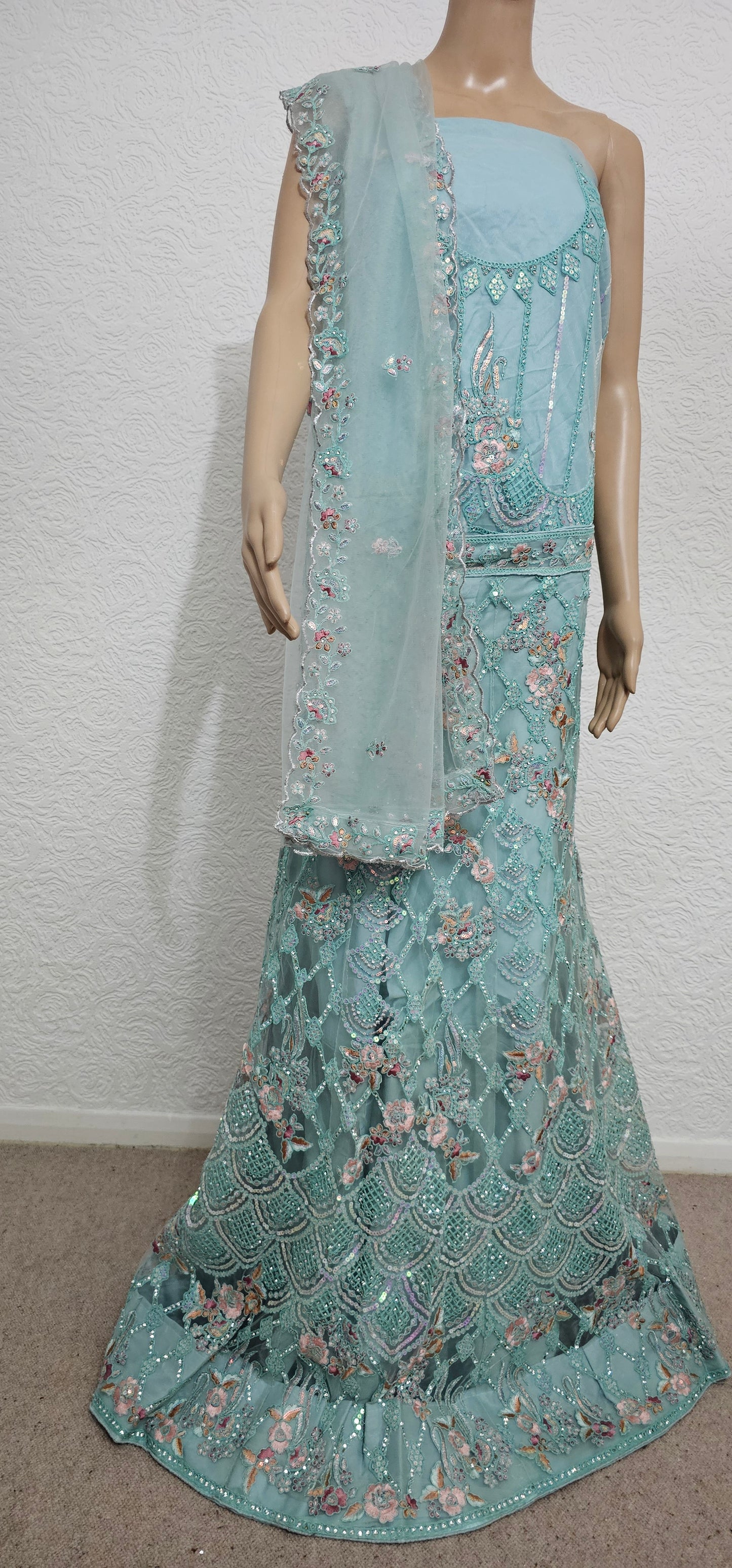 Manbhari Mint Net Semi Stitched Lehenga Choli With Dupatta